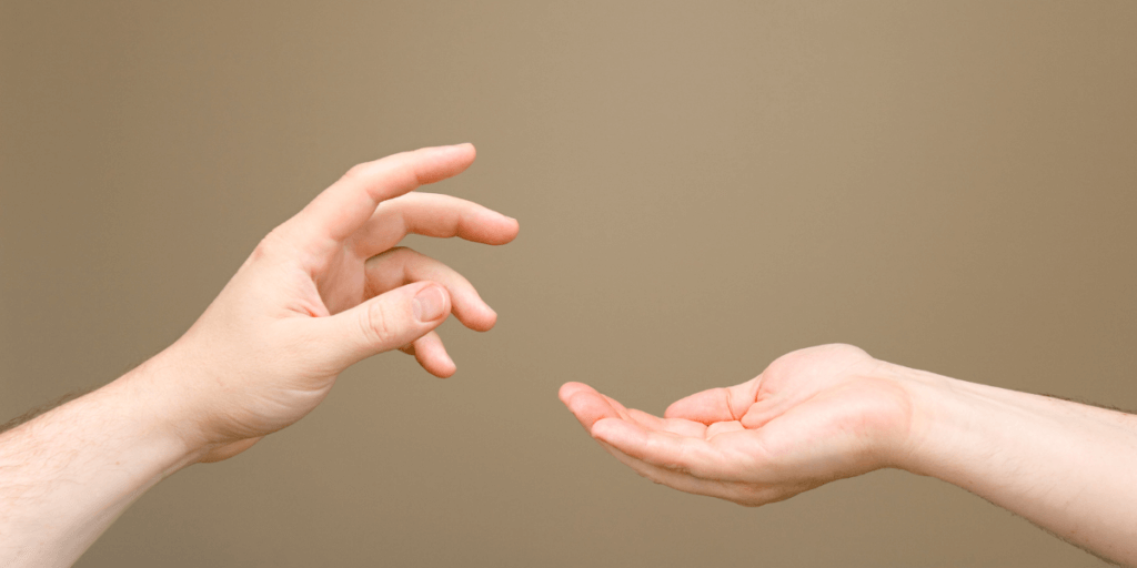 Deux mains symbolisant la relation donnant donnant